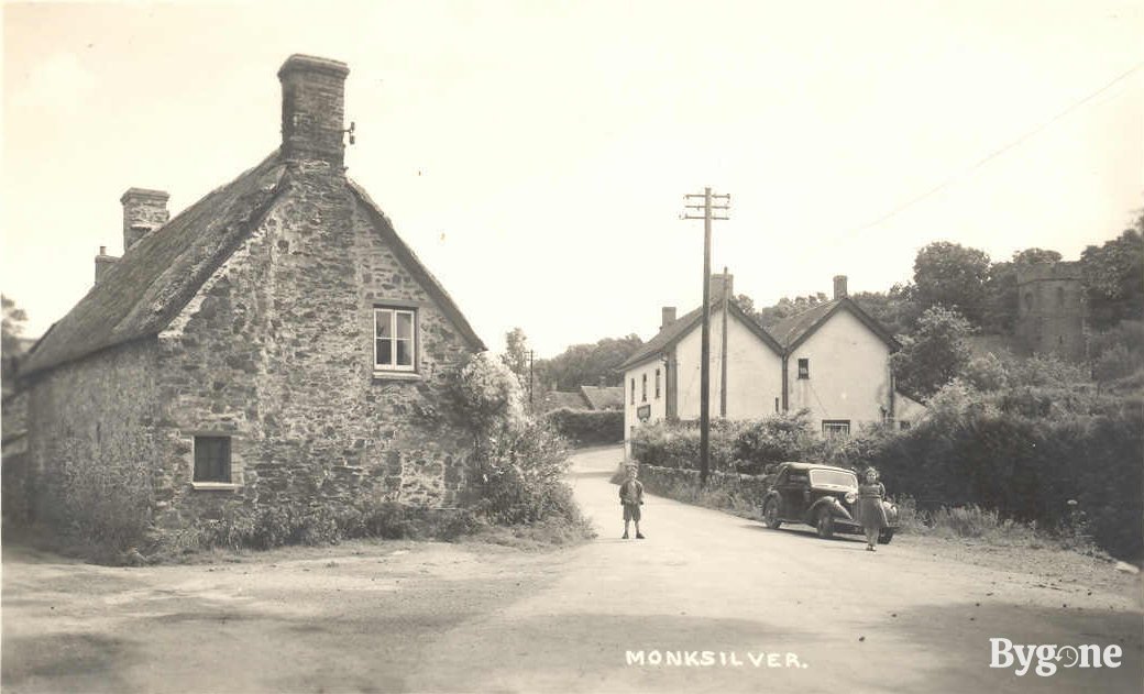 Monksilver, car by house
