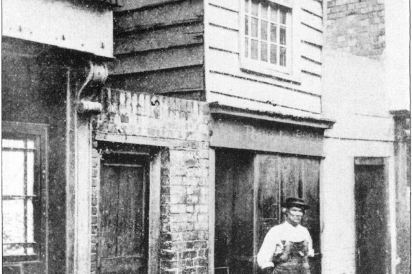 Unknown man outside John Pounds' shop, Highbury Street, Old Portsmouth.
